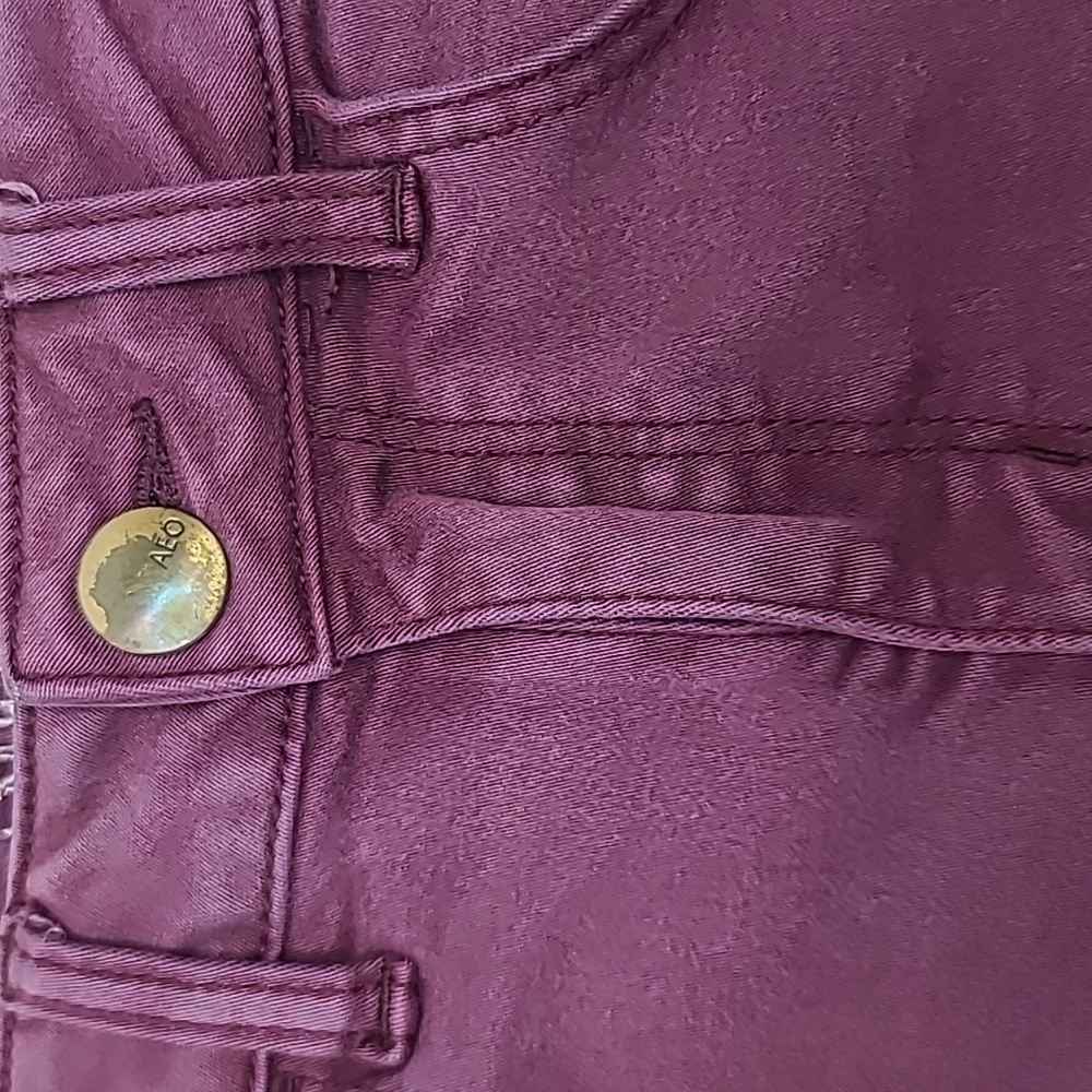 AE Next Level Low Rise Cuffed Raw Hem Cotton Denim Shortie Shorts in Burgundy - Picture 11 of 17